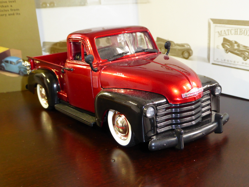 Jada did a great job with the 2 tone look. The cab and bed are molded separately. The hood side emblems which read 3100 is painted on instead of separate parts.